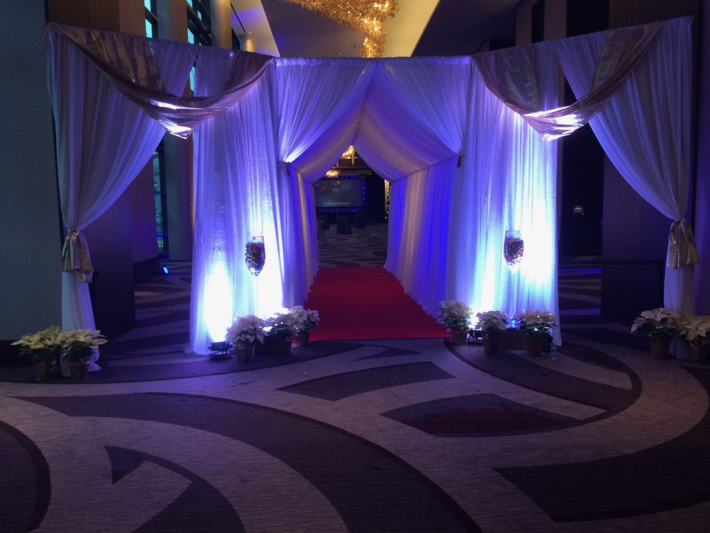 Tunnel entrance with curtains and lighting